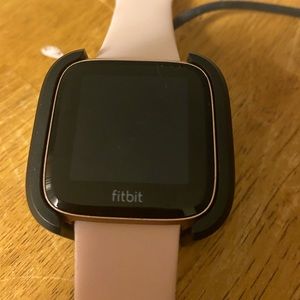 Rose gold Fitbit Versa Lite